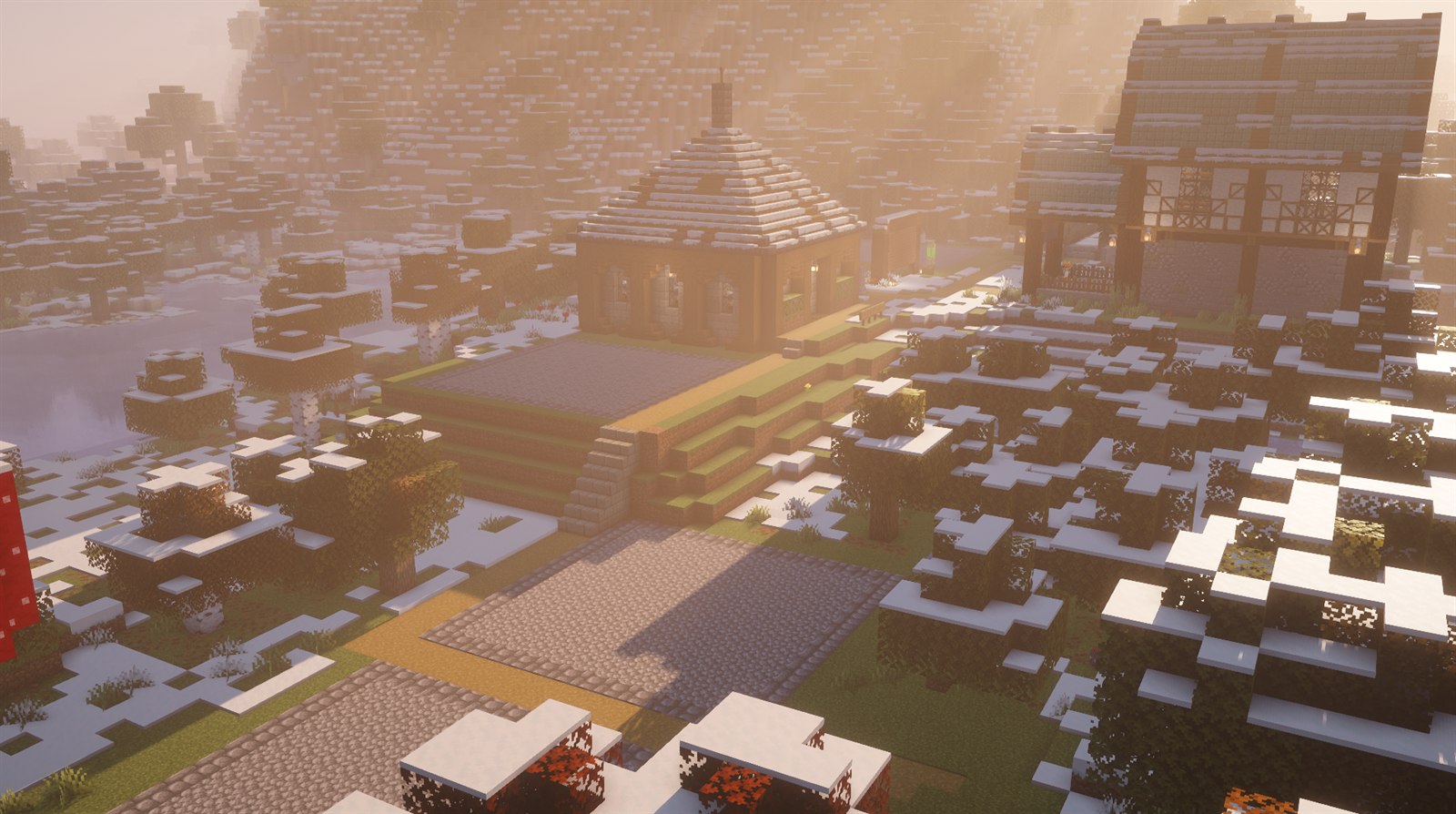 A Minecraft settlement with timber buildings and paths in a snowy birch forest at golden hour